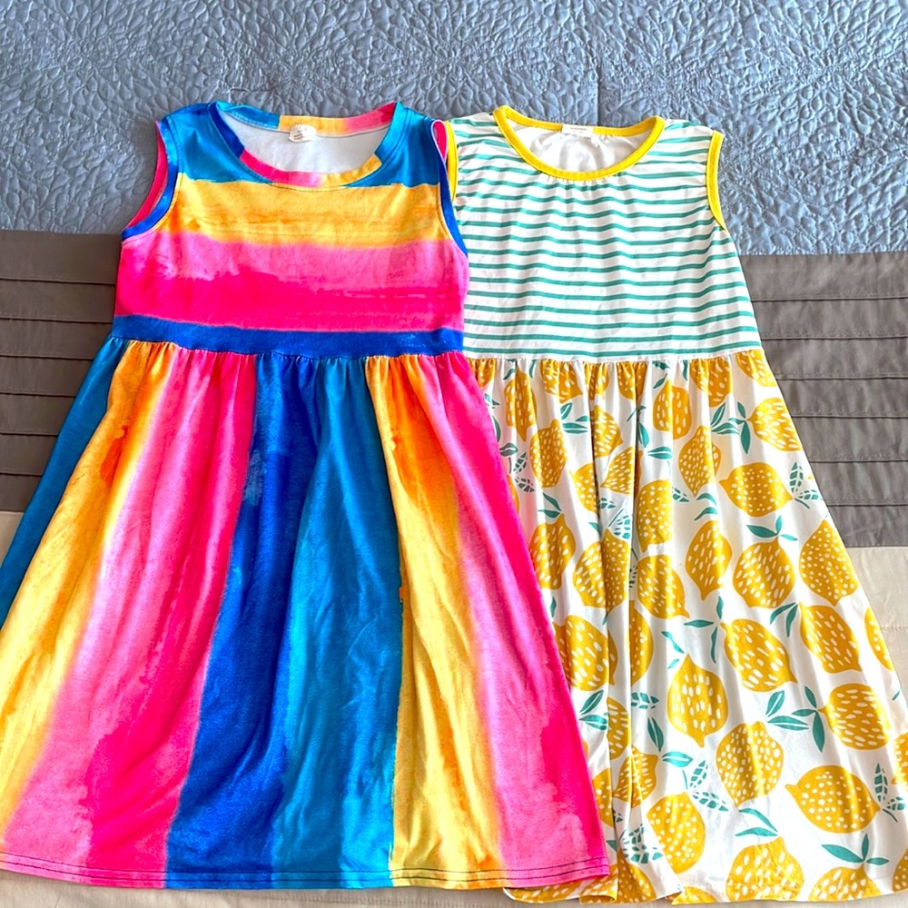 Girls size 8-9 spring-summer dresses. 95% cotton 5% polyester. Lightly used.
